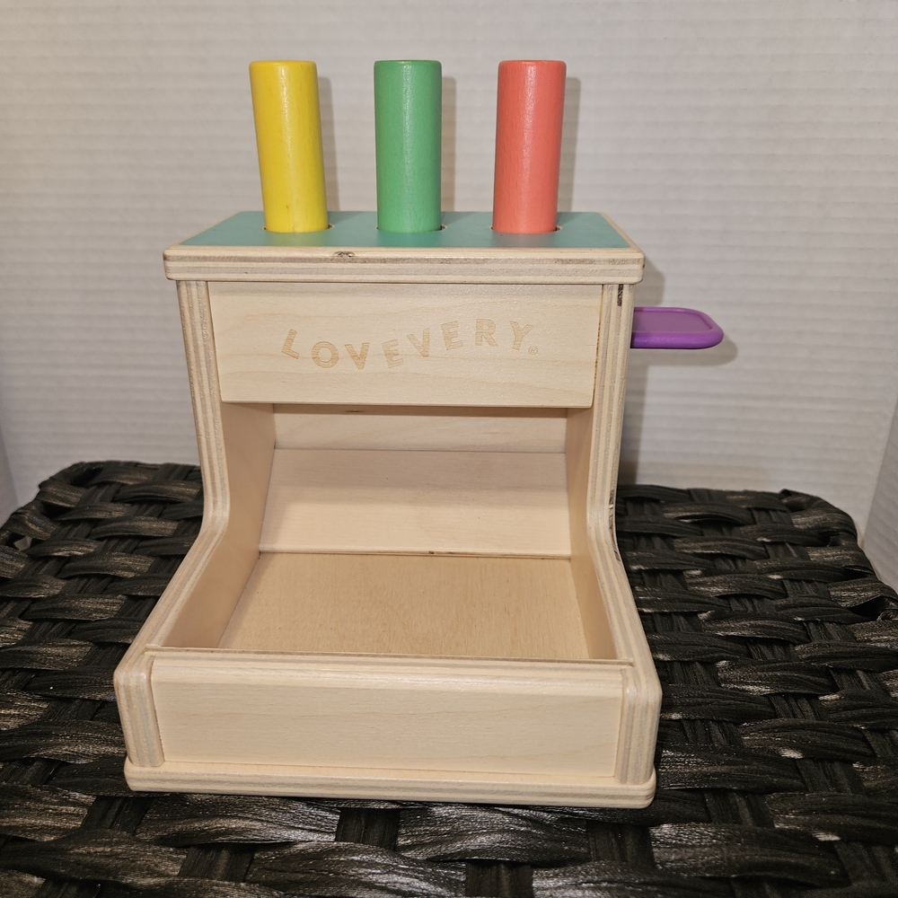 Lovevery Wooden Peg Drop Toy with Colorful Pegs